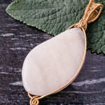 Load image into Gallery viewer, Sakura Pendant in Bronze - back view - BellaChel Jeweler