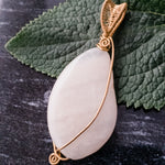 Load image into Gallery viewer, Sakura Pendant in Bronze - front view - BellaChel Jeweler