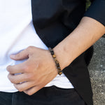 Load image into Gallery viewer, Viking Collection - Real Tiger Eye Bracelet - shown on a model - BellaChel Jeweler