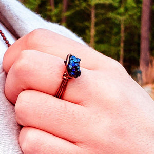 Peacock Ora Ring in Antique Copper pictured on models hand - BellaChel Jeweler