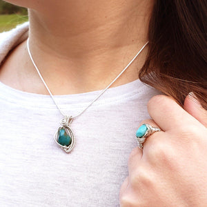 Laguna Collection - Beautifully Unique Turquoise Pendant in Sterling Silver front view on person - BellaChel Jeweler