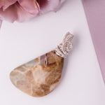 Cargar imagen en el visor de la galería, Laguna Collection - Fossil Fisheye Agate Necklace Pendant in Sterling Silver front view - BellaChel Jeweler
