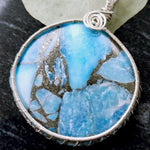Cargar imagen en el visor de la galería, Laguna Collection - Beautiful Blue Turquoise and Pyrite Pendant weaved in Sterling Silver close-up view - BellaChel Jeweler
