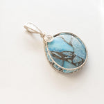 Charger l&#39;image dans la galerie, Laguna Collection - Beautiful Blue Turquoise and Pyrite Pendant weaved in Sterling Silver side view  - BellaChel Jeweler
