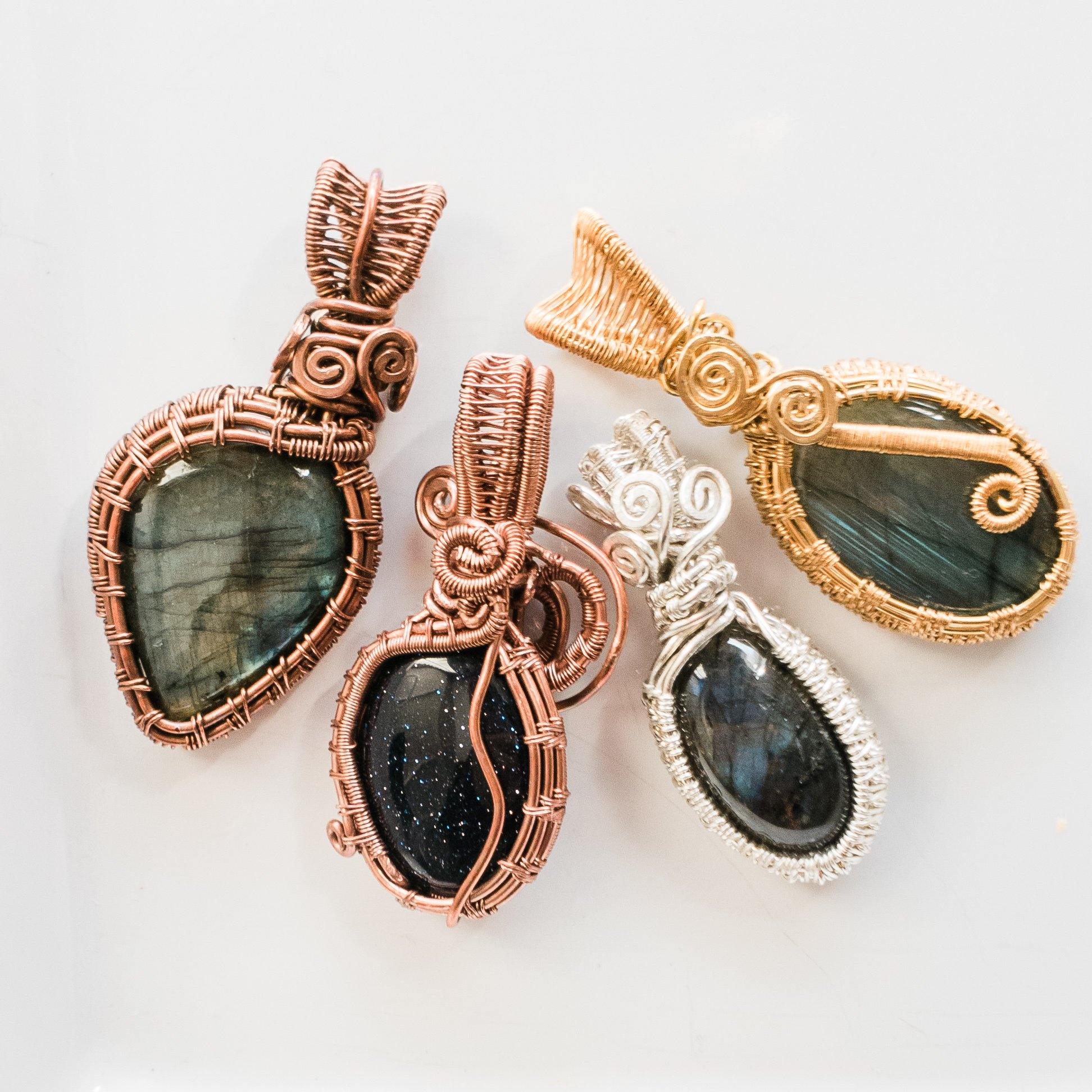 Group picture of Beautiful Labradorite Pendants in Sterling Silver, Antique Copper and Bronze - BellaChel Jeweler