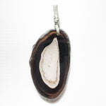 Load image into Gallery viewer, Unique Black and White Geode Crystal Necklace - designed to be worn on both sides - BellaChel Jeweler
