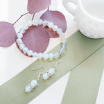 Load image into Gallery viewer, Celestial Collection - Beautiful Opalite Bracelet and Dangle Earrings with Cubic Zirconia Accents - top view - BellaChel Jeweler
