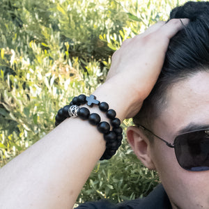 Real Shungite Bracelet with Cross, 10mm bead - on a model wearing 2 Shungite bracelets, sold separately - BellaChel Jeweler