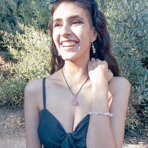 Rose Quartz Nugget in Sterling Silver - shown on a model also wearing a rose quartz bracelet and matching earrings, also for sale - BellaChel Jeweler