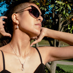 Load image into Gallery viewer, Dainty Moonstone Sterling Silver Pendant Necklace and Moonstone earrings on a model - BellaChel Jeweler
