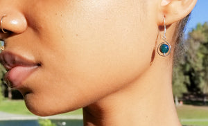 Laguna Collection - Stunning Blue Tiger Eye Earrings - shown on a model - BellaChel Jeweler