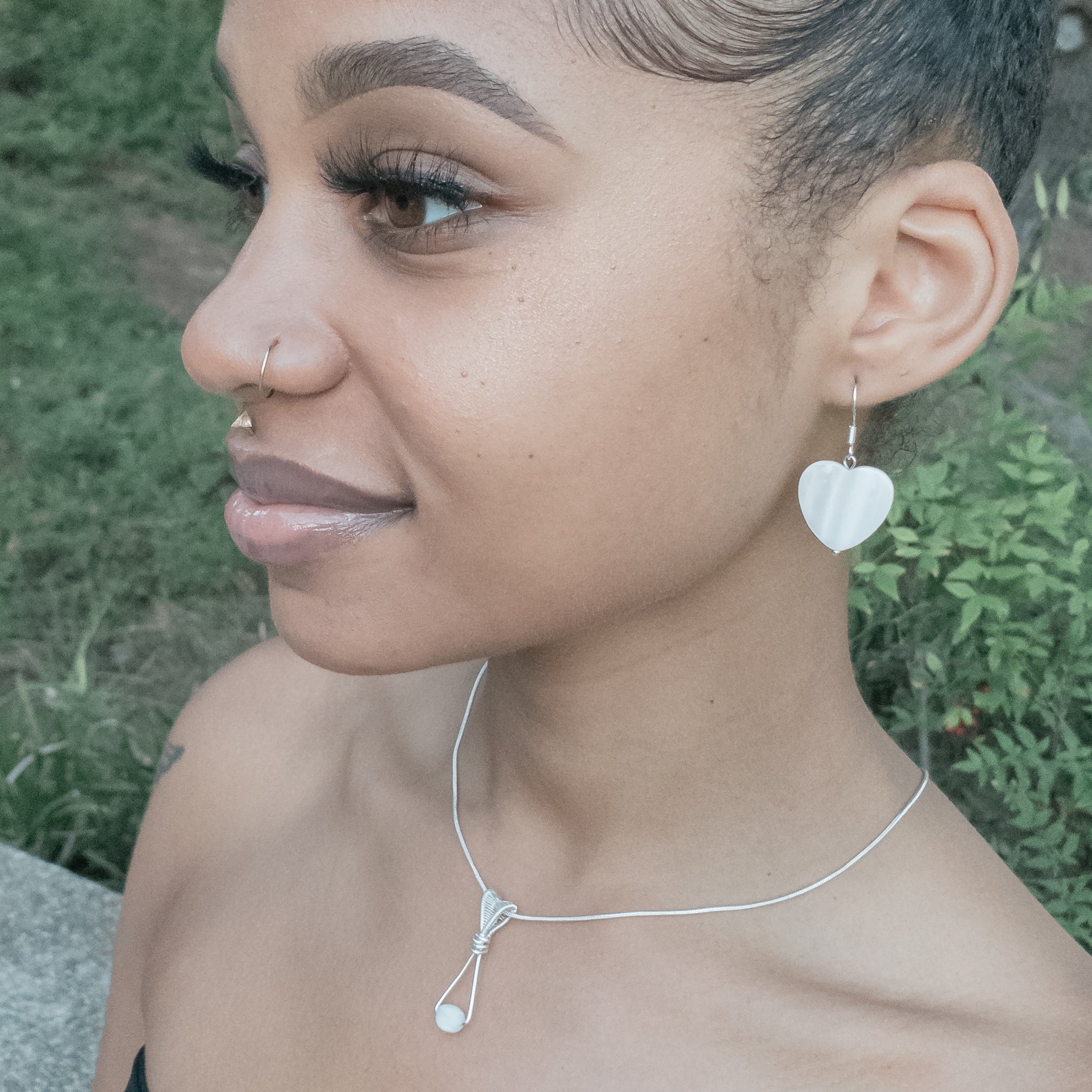 Dainty Moonstone Sterling Silver Pendant Necklace on a model - BellaChel Jeweler