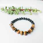 Load image into Gallery viewer, Viking Collection - Tiger Eye Cushion Bead &amp; Lava Stone Bracelet, close up view - BellaChel Jeweler
