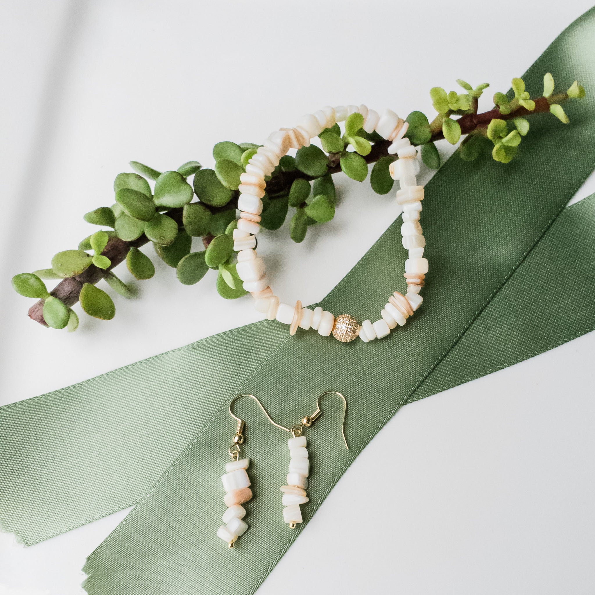 Gorgeous Seashell Bracelet & Earrings with Cubic Zirconia Accent - close up pic - BellaChel Jeweler