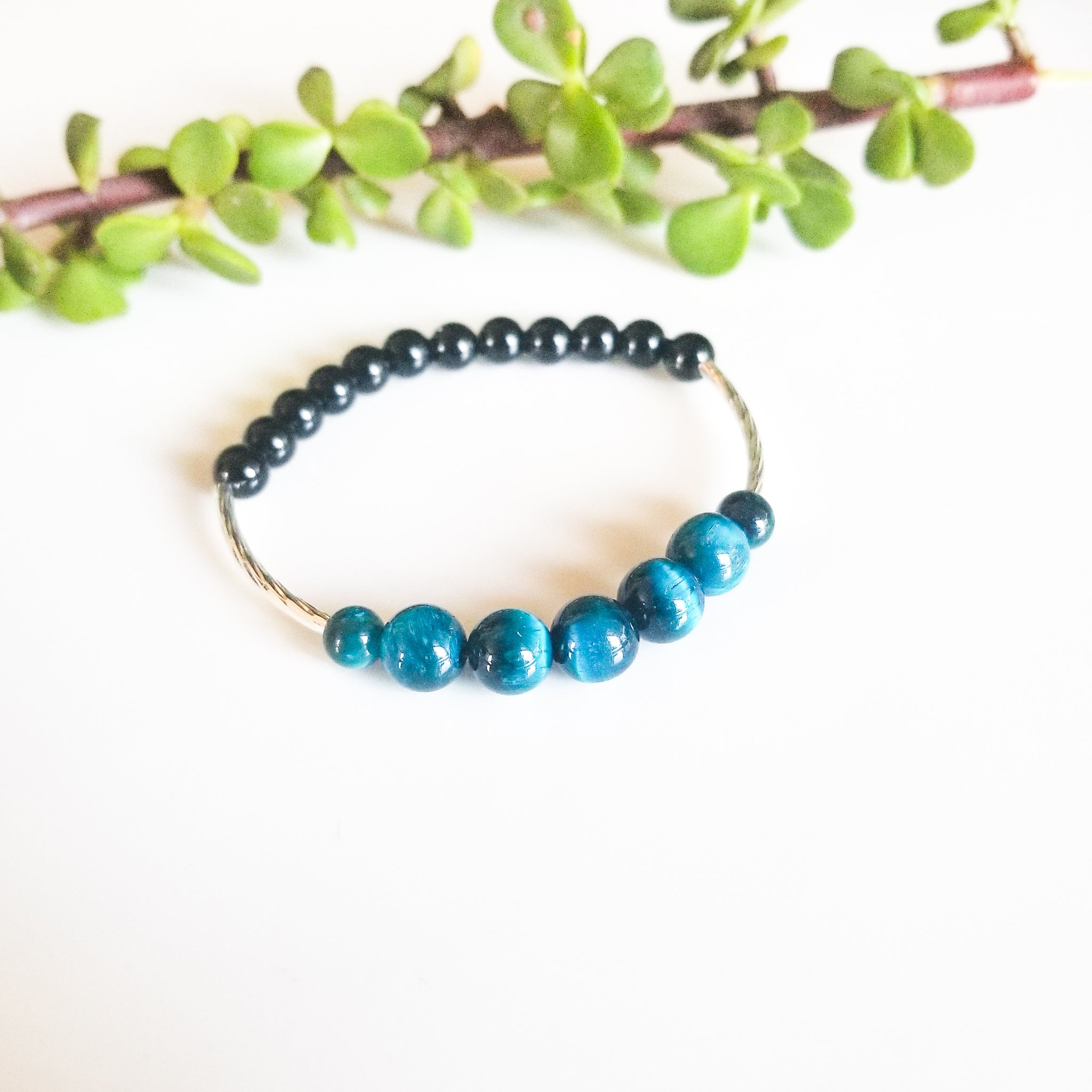 Laguna Collection - Soothing Blue Tiger Eye Bracelet with Silver Accents shown up close - BellaChel Jeweler