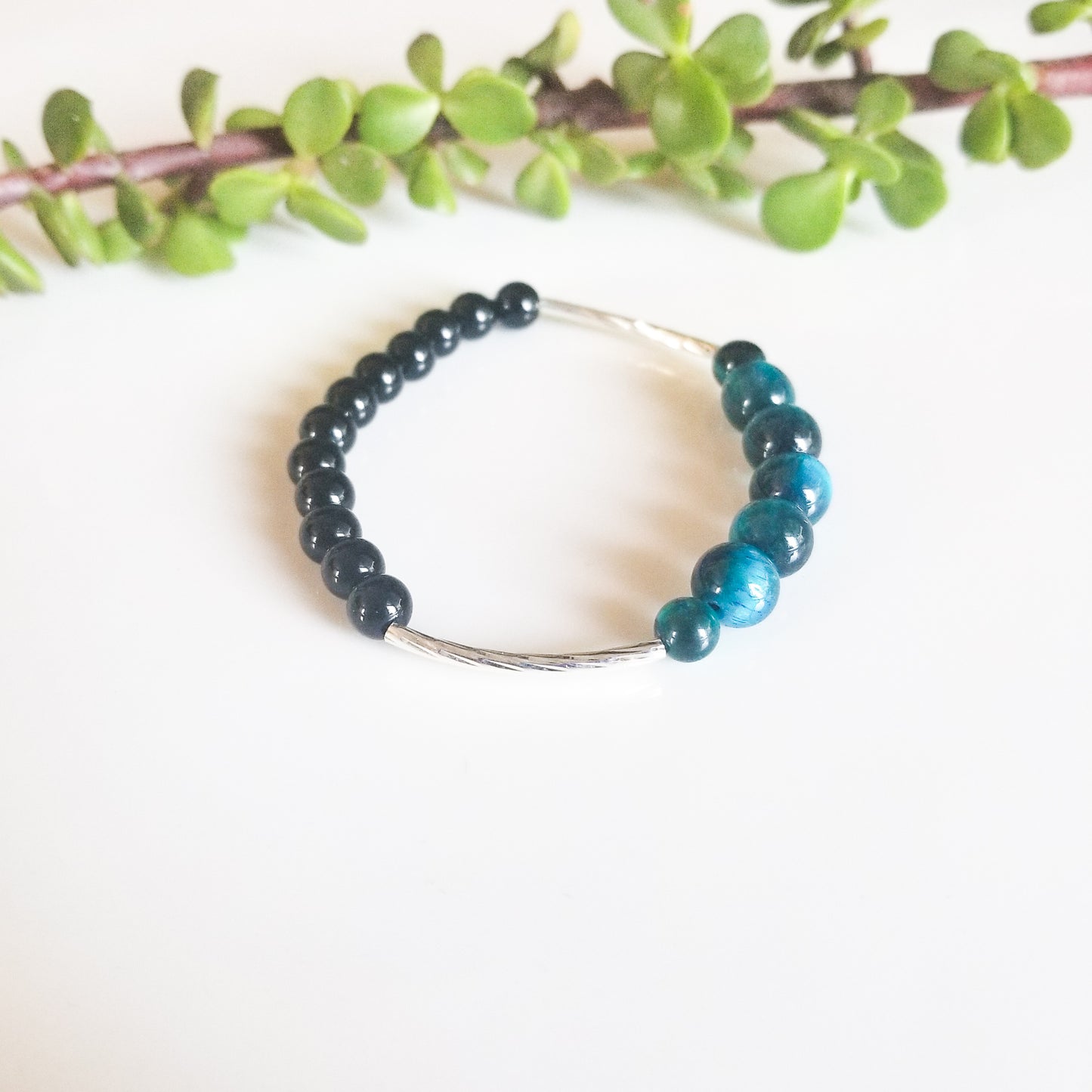 Powerful Blue Tiger Eye Bracelet with Silver Accents shown up close side view - BellaChel Jeweler