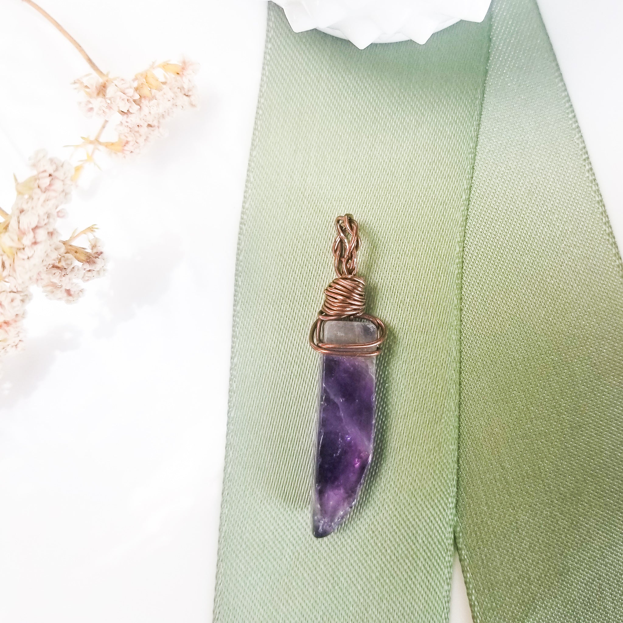 Beautiful Brazilian Amethyst Pendant in Antique Copper with a braided Bale - top view - BellaChel Jeweler