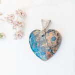 Load image into Gallery viewer, Rio Collection - Blue Ghost Eye Heart in Sterling Silver - front view - BellaChel Jeweler

