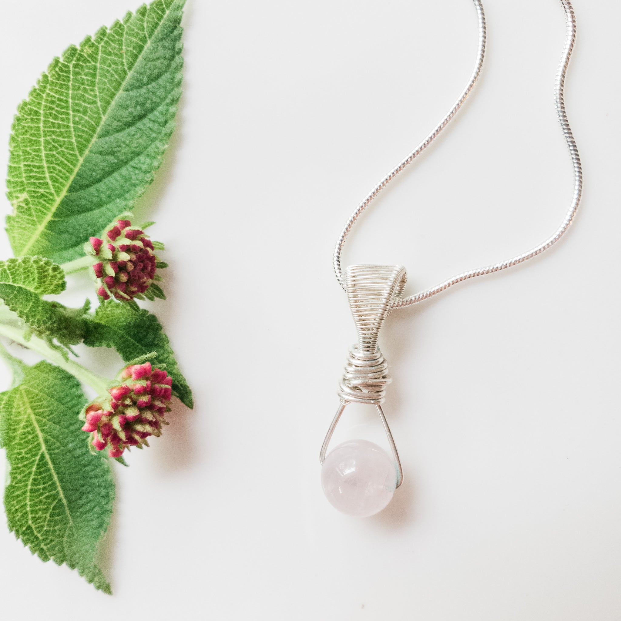 Signature Collection - Natural Rose Quartz Pendant on Sterling Silver Necklace close-up view - BellaChel Jeweler