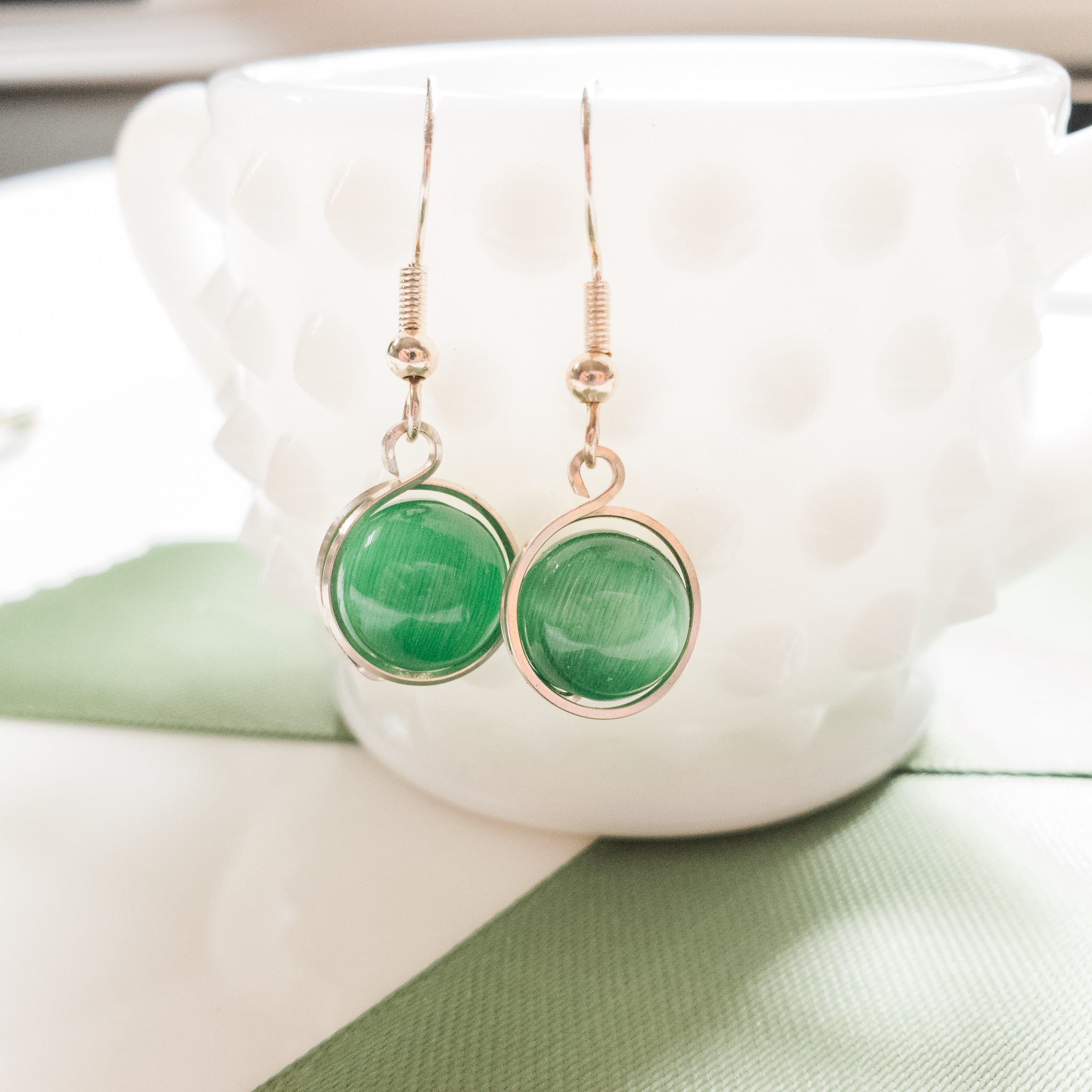 Green Cats Eye Earrings Wrapped in Sterling Silver - Close-up view - BellaChel Jeweler