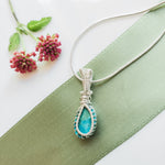 Load image into Gallery viewer, Laguna Collection - Authentic Turquoise Necklace in Sterling Silver - Bastet Style close up back side view - BellaChel Jeweler
