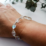 Load image into Gallery viewer, Quartz, iridescent wire wrapped bracelet, silver/BellaChel Jeweler

