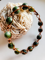 Load image into Gallery viewer, Dark Green Jade in Antique Copper Wire Wrapped Bracelet

