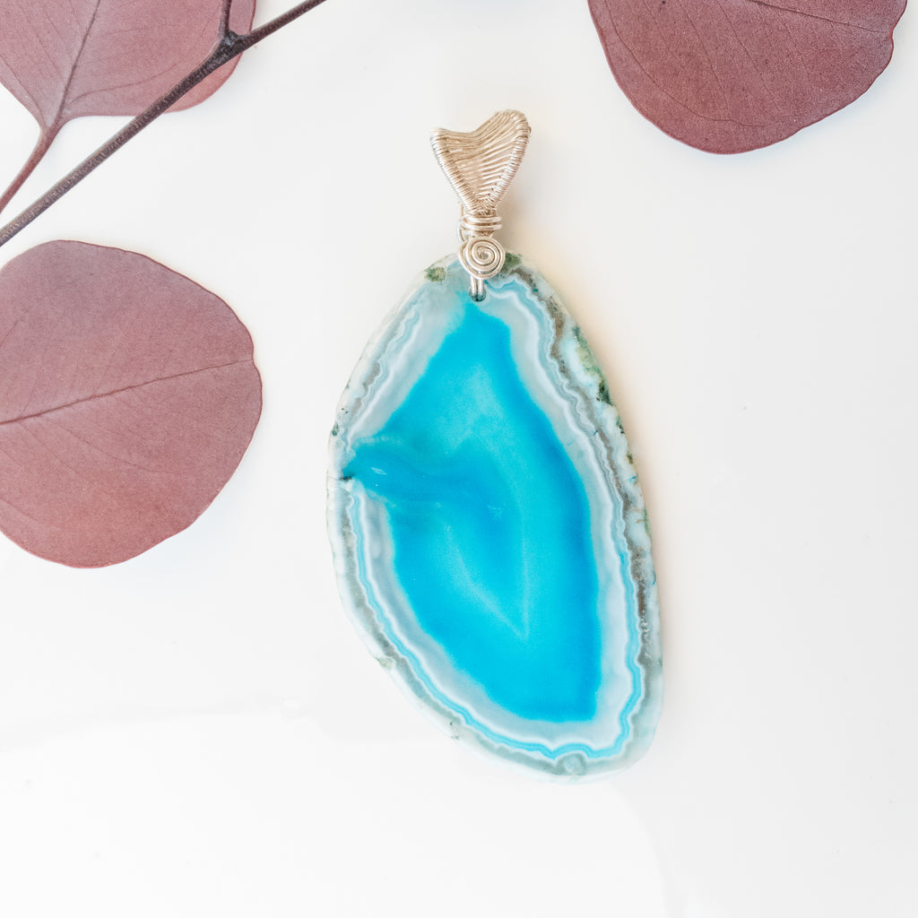 Rio Collection - Striking Blue Sliced Geode Agate Pendant close up view - BellaChel Jeweler