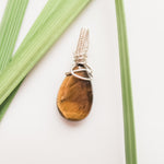 Load image into Gallery viewer, Viking Collection - Tiger Eye Teardrop Pendant designed in Sterling Silver. One-of-a-Kind - Back side view - BellaChel Jeweler
